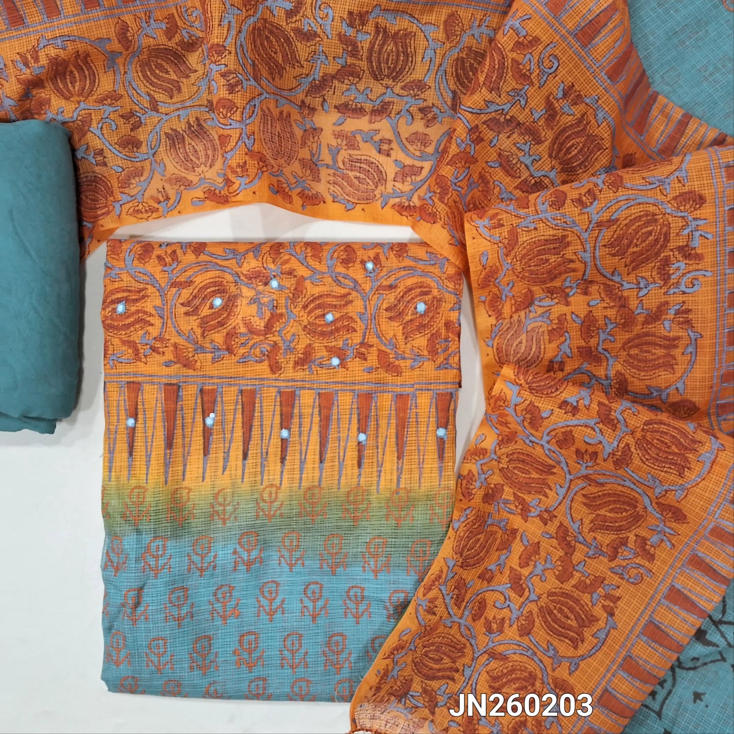 PREORDER SHIPPING AFTER 15 DAYS Blueish grey& orange block printed kota unstitched salwar material,faux mirror work on yoke(Lining Needed) spun cotton bottom,hand block printed dual shaded kota dupatta. JN260203