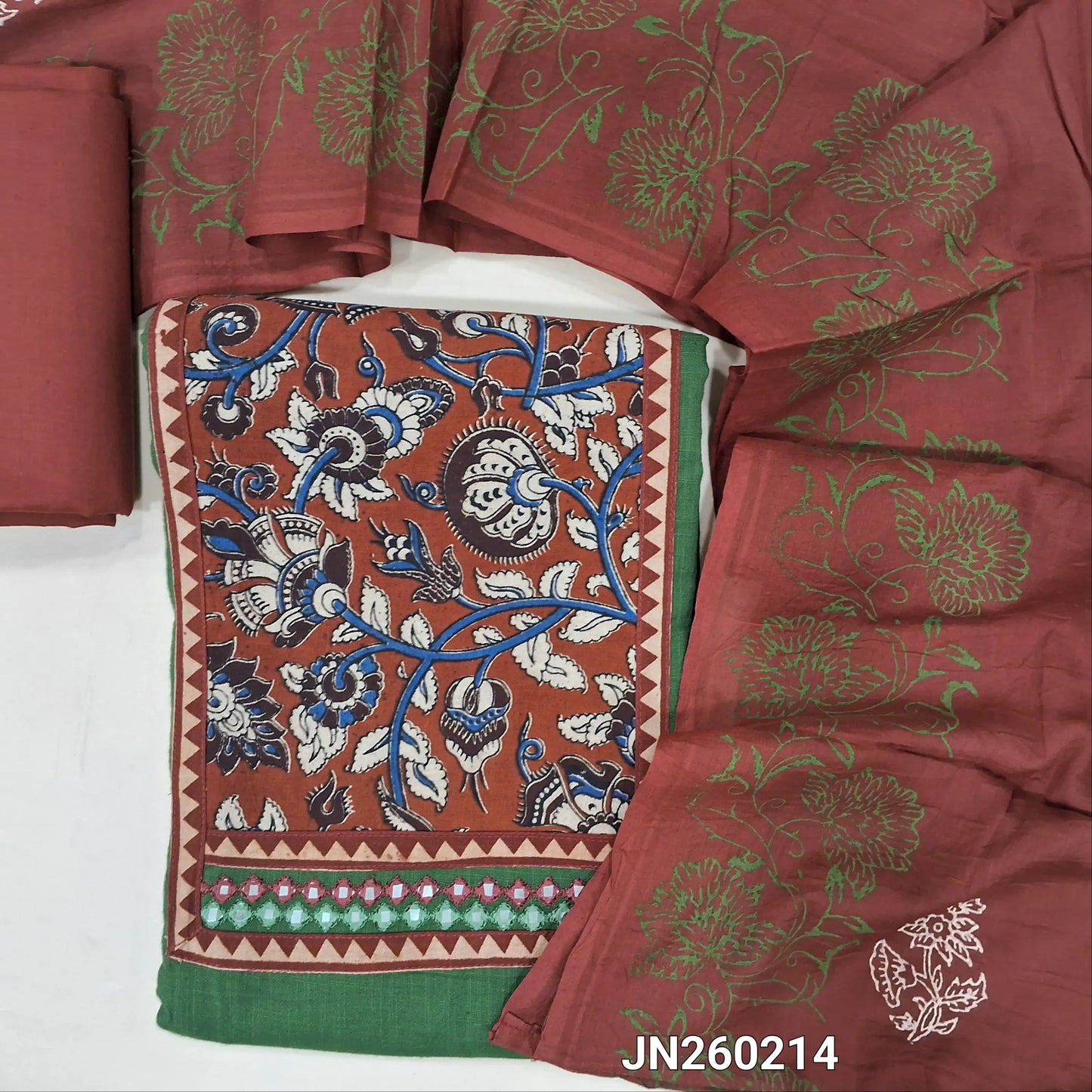 Green pure cotton unstitched salwar material,hand block printed kalamkari yoke patch with faux mirror work,(lining needed)maroon cotton bottom,hand block printed mul cotton dupatta. JN260214