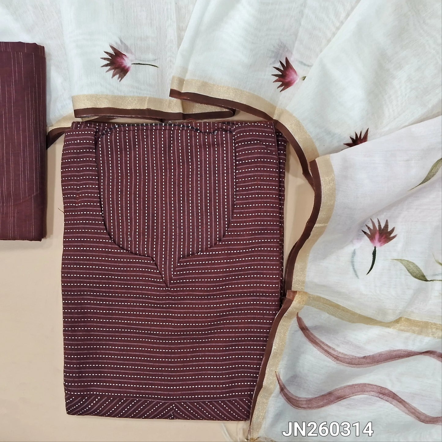 Dark wine purple soft kantha cotton unstitched salwar material,round notch neck,kantha stitch work all over,(Lining optional)soft cotton bottom,brush paint work on silk cotton dupatta with gold tissue borders. JN260314