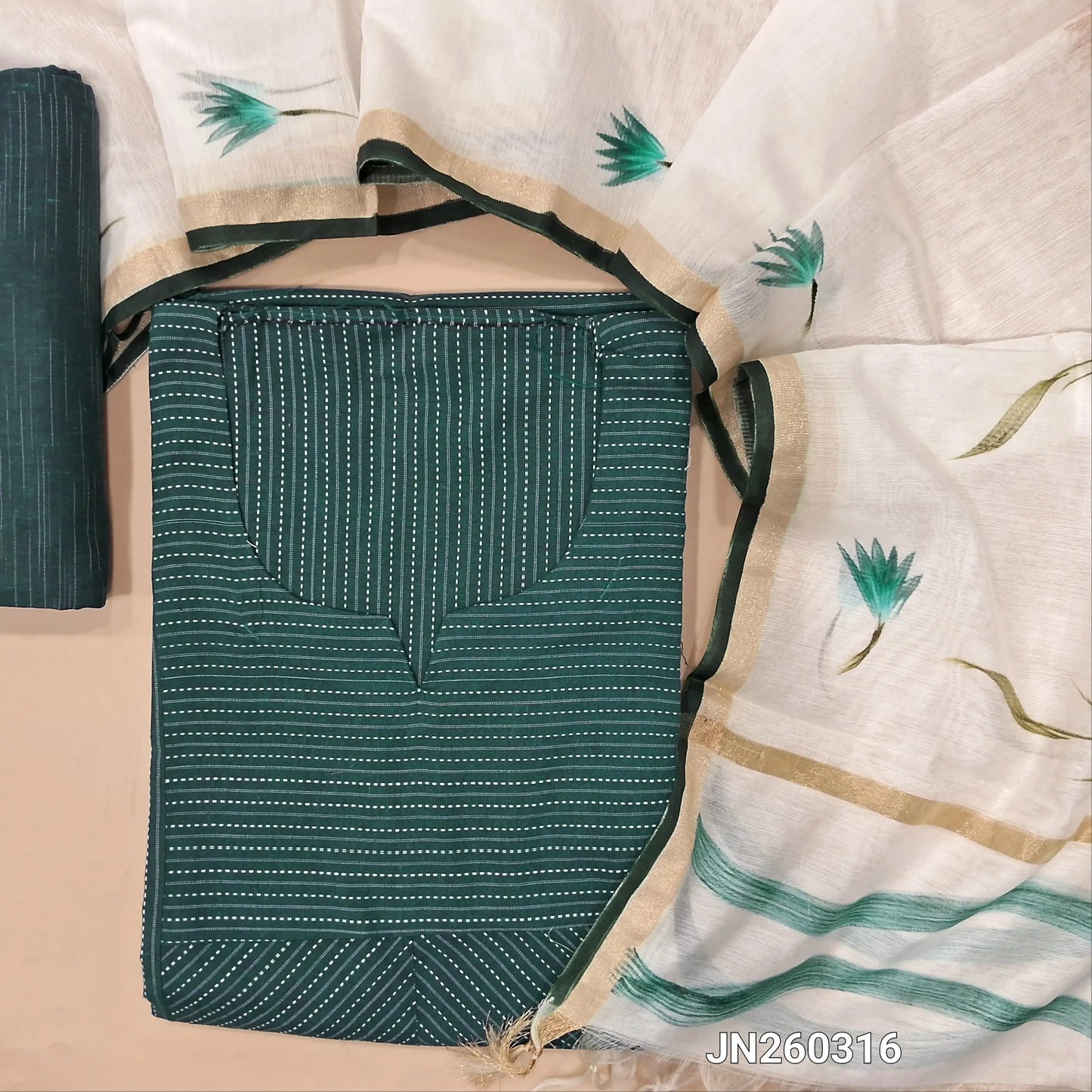 Teal blue soft kantha cotton unstitched salwar material,round notch neck,kantha stitch work all over,(Lining optional)soft cotton bottom,brush paint work on silk cotton dupatta with gold tissue borders. JN260316
