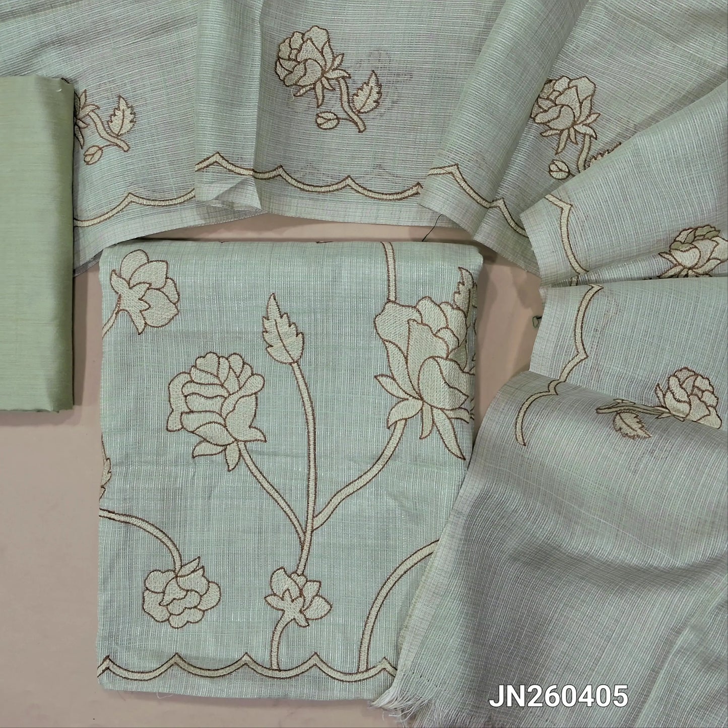 Designer pale green tissue kota unstitched salwar material (soft,lining needed) rich embroidery work on front,matching silk cotton bottom, floral embroidery work on tissue kota dupatta with scallop borders. JN260405