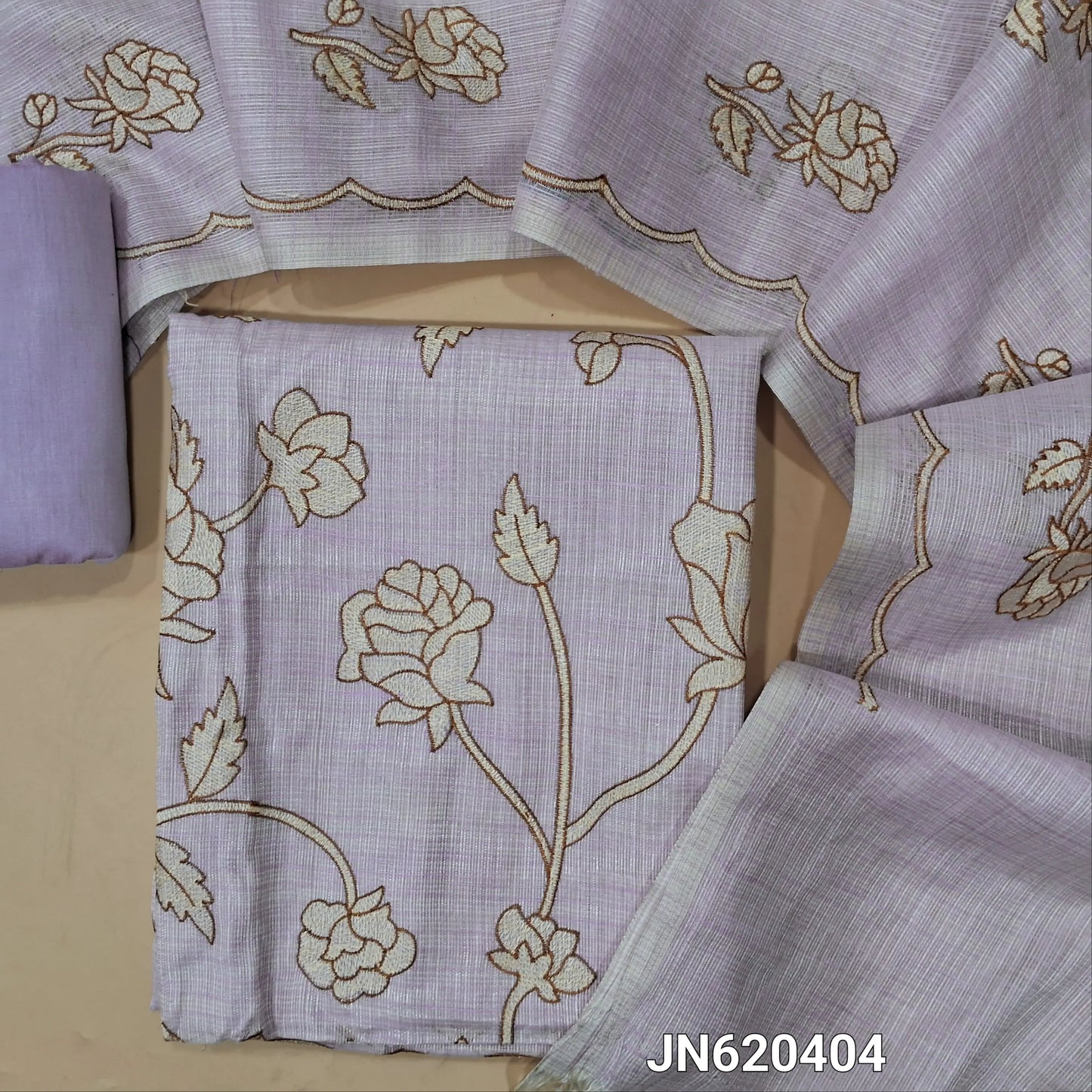 Designer lavender shade tissue kota unstitched salwar material (soft,lining needed) rich embroidery work on front,matching silk cotton bottom, floral embroidery work on tissue kota dupatta with scallop borders.JN260404