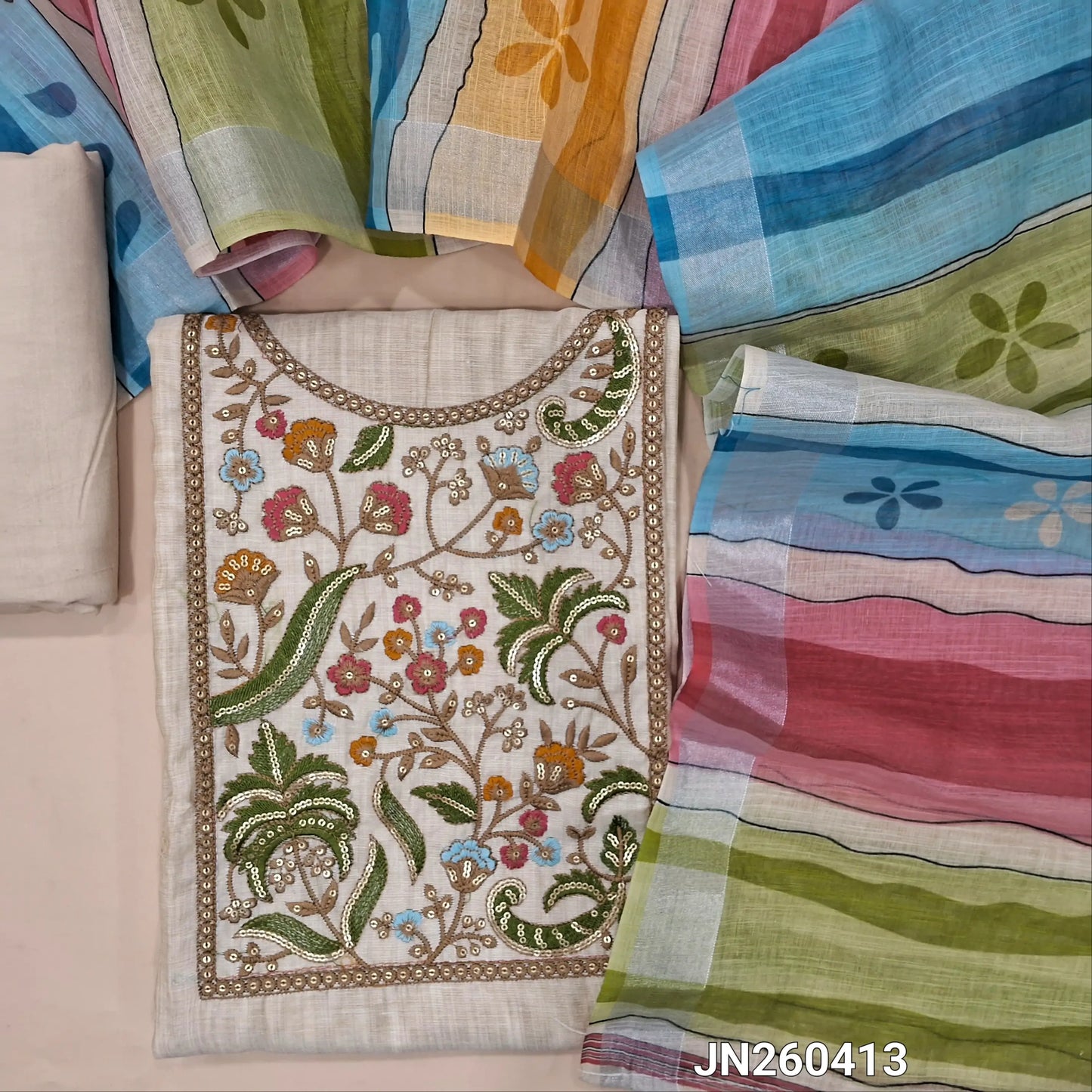Designer light beige soft silk cotton unstitched salwar material,(light weight,lining needed)(GREEN) rich embroidery & sequins work on yoke,matching spun cotton bottom, multicolour semi linen dupatta with gold tissue borders. JN260413