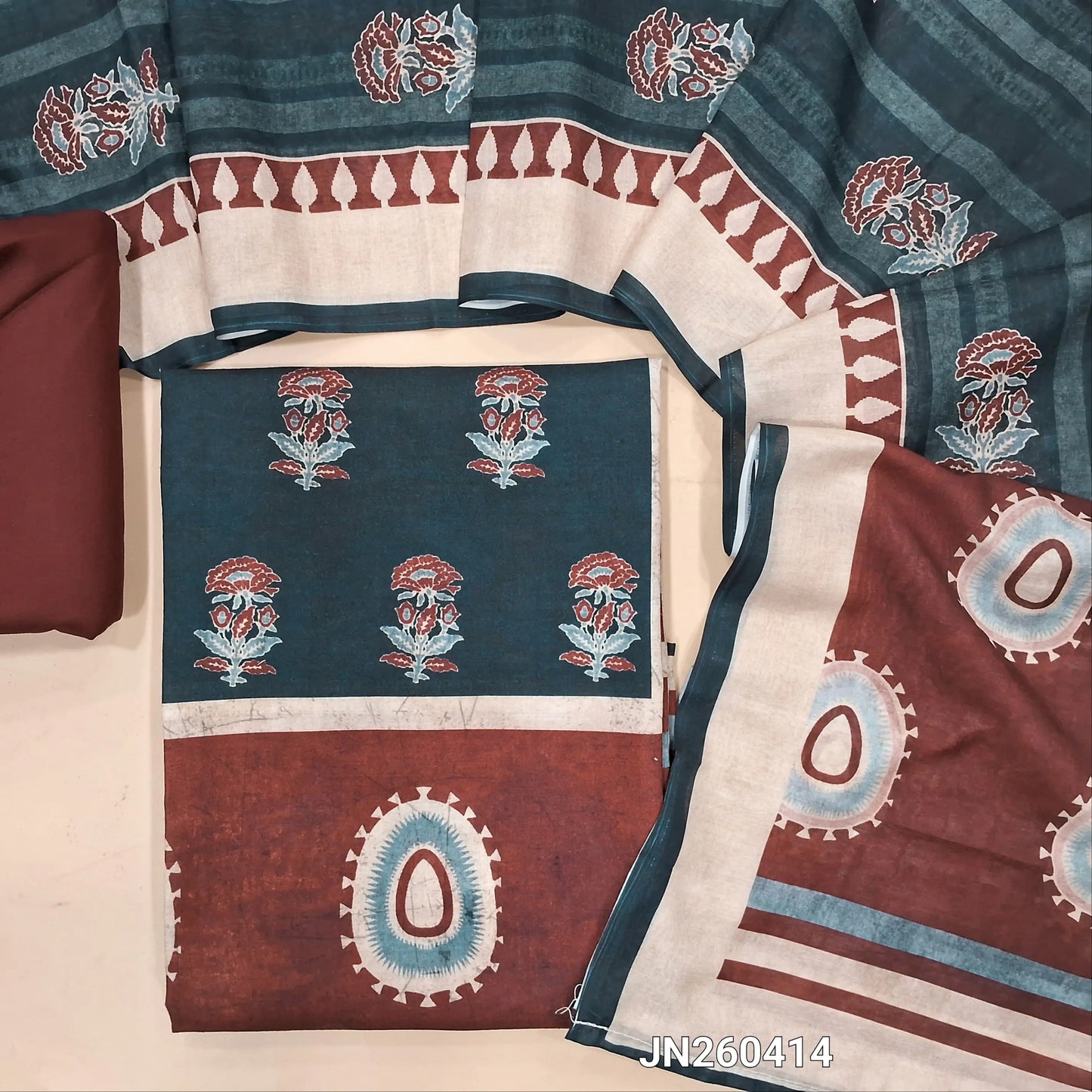 Dark grey digital printed silk cotton unstitched salwar material(lining optional)panel design on front,ajrak prints all over, maroon cotton bottom, digital printed soft silk cotton dupatta. JN260414