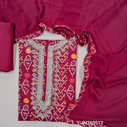 Bright pink bandhini printed satin cotton unstitched salwar material,zari & sequins work on yoke(lining optional)matching spun cotton bottom,fancy soft chiffon dupatta with printed tappings. JN260512