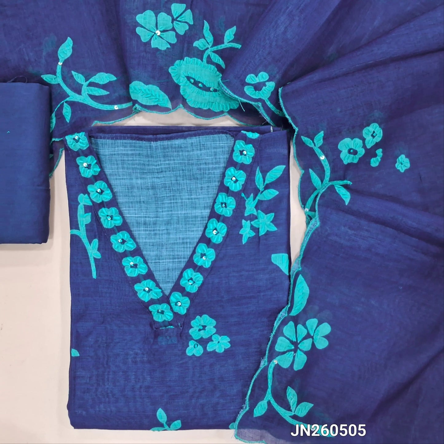 Designer royal blue digital printed pure linen unstitched salwar material, v neck, hand embroidered on front(thin, lining needed)matching santoon bottom, floral printed pure linen dupatta with hand embroidery& scallop edges.JN260505