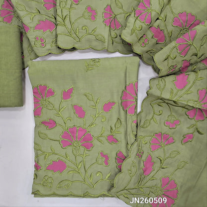 Sage green soft silk cotton unstitched salwar material (lining needed) embroidery work on front, self embroidery and applique patch work on daman ,matching santoon bottom, rich applique &self embroidery work on silk cotton dupatta. JN260509