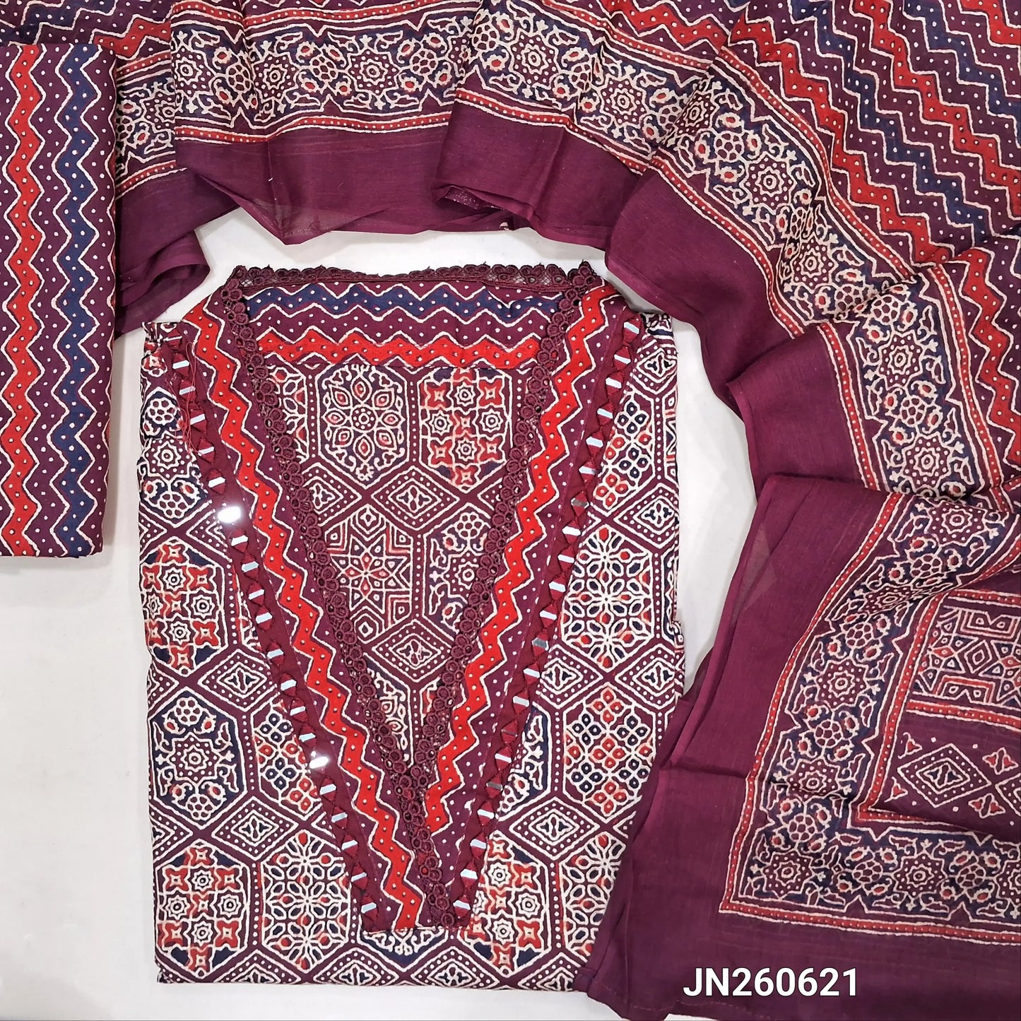 Dark maroon ajrak hand block printed pure cotton unstitched salwar material,collared neck with real mirror(lining optional)printed cotton bottom,printed full length mul cotton dupatta.JN260621