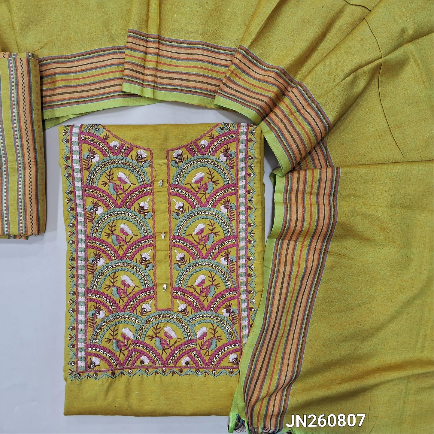 Mehandhi yellow spun silk cotton unstitched salwar material, embroidery work on yoke,(lining needed)printed spun silk cotton bottom, spun silk cotton dupatta with borders. JN260807