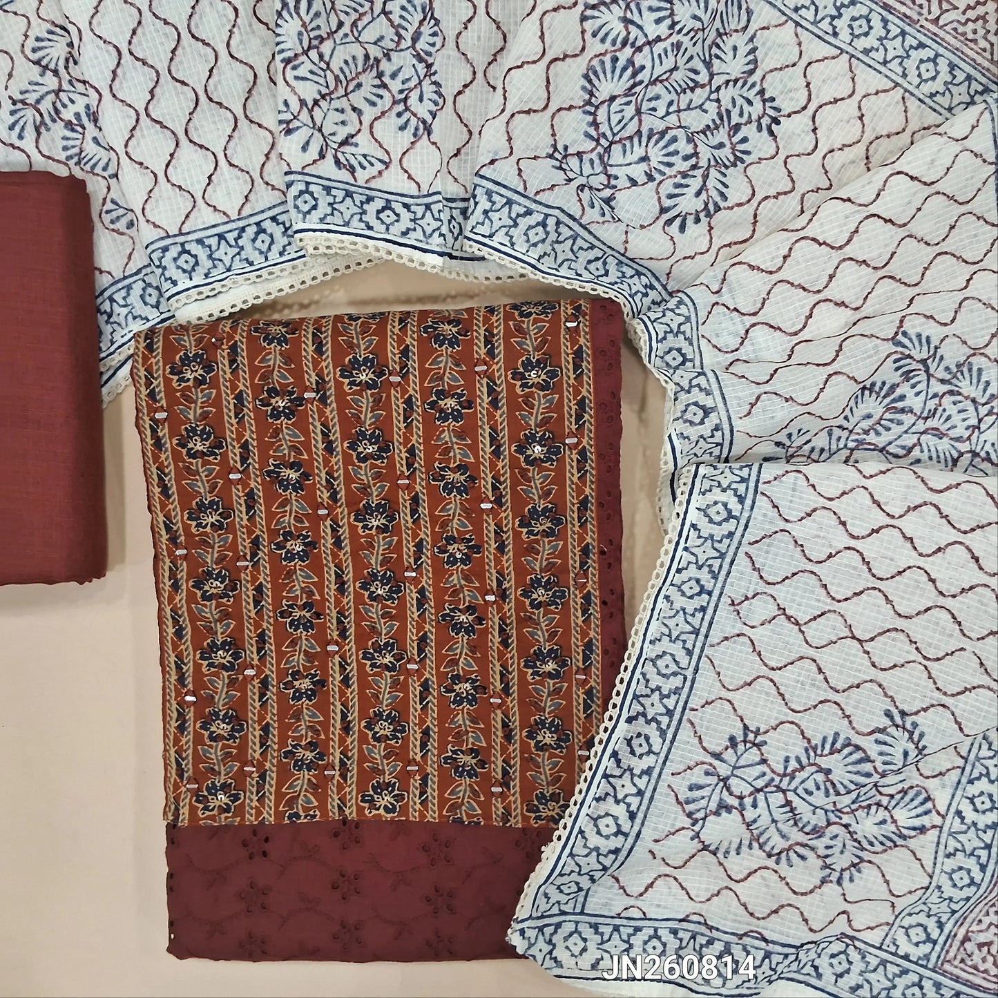 Dark maroon schiffli embroidered pure cotton unstitched salwar material,floral printed and real mirror on yoke,(lining needed)slub cotton bottom, hand block printed kota cotton dupatta. JN260814