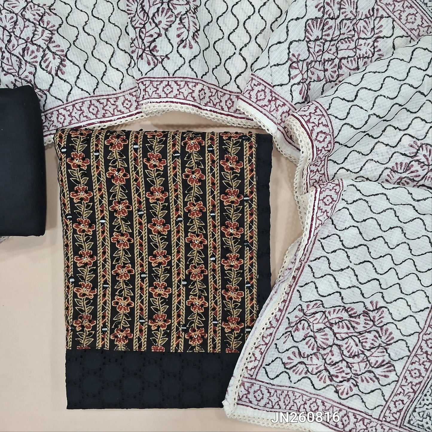 Black schiffli embroidered pure cotton unstitched salwar material,floral printed and real mirror on yoke,(lining needed)slub cotton bottom, hand block printed kota cotton dupatta. JN260816