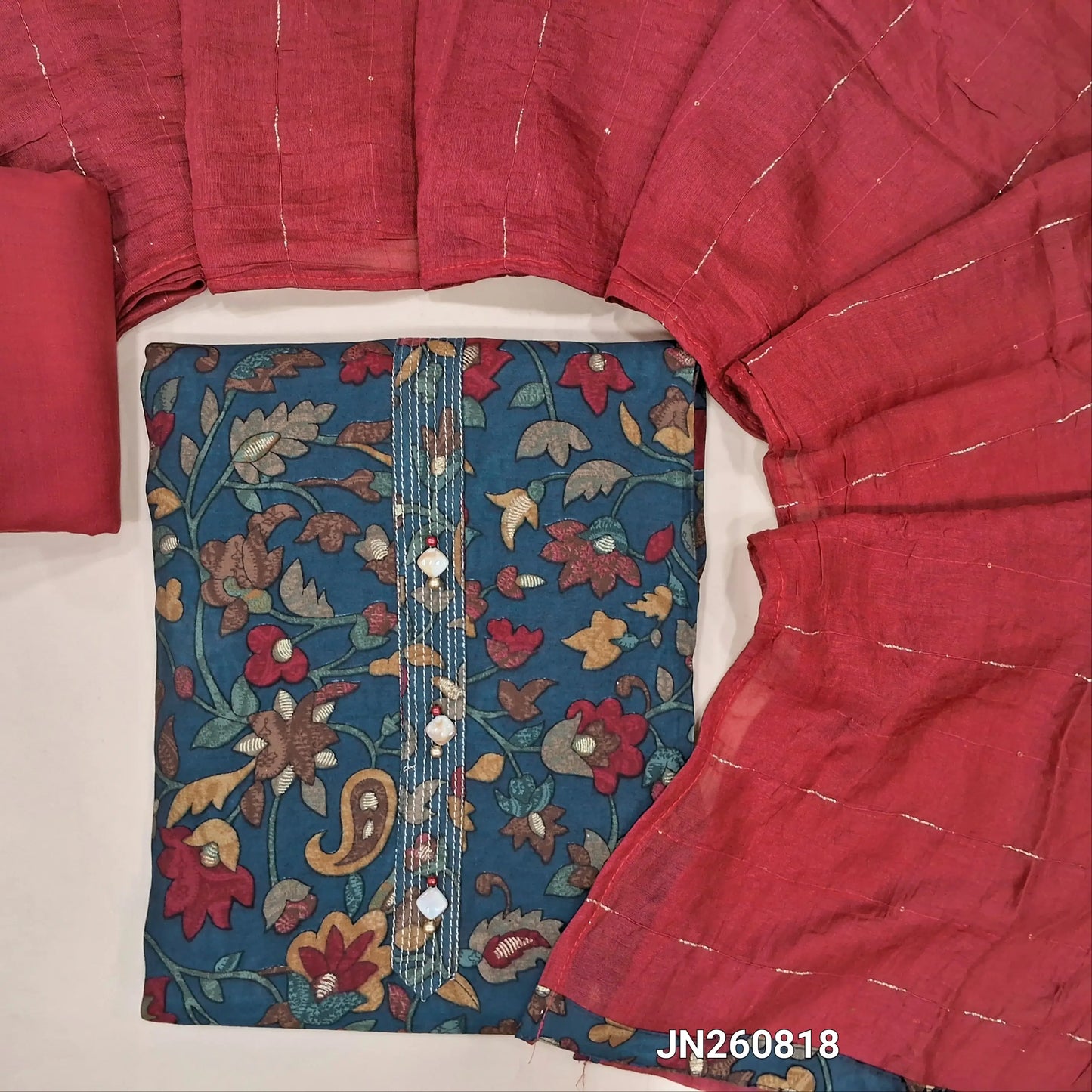 Dark blue digital printed silk cotton unstitched salwar material, zari work on yoke, (lining needed) reddish maroon cotton bottom,zari and sequins work on soft silk cotton dupatta. JN260818