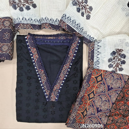 Black schiffli embroidery dobby cotton unstitched salwar material,collar neck with ajrak &real mirror work on yoke,(lining needed)blue printed cotton bottom, block printed kota dupatta with applique work on pallu. JN260906