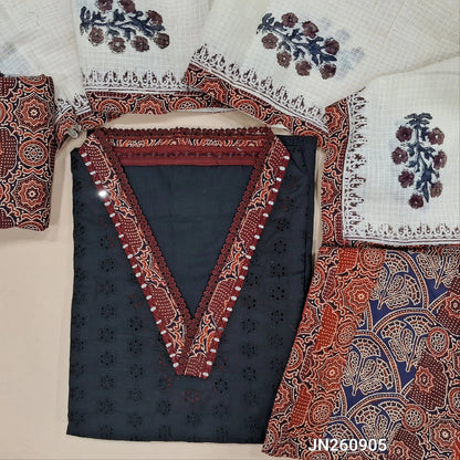 Black schiffli embroidery dobby cotton unstitched salwar material,collar neck with ajrak &real mirror work on yoke,(lining needed)maroon printed cotton bottom, block printed kota dupatta with applique work on pallu. JN260905