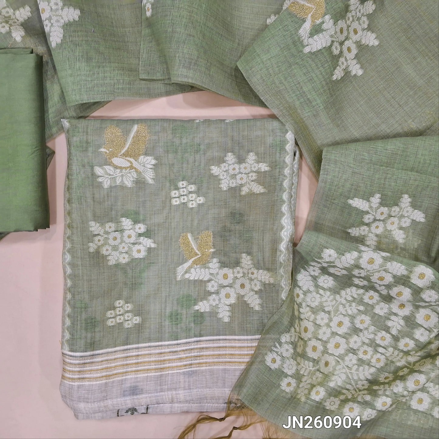 Sage green jamdani woven premium silk cotton unstitched salwar material ( soft,lining needed) panel jamdani woven on front, mughal printed all over,matching silky bottom, jamdani woven silk cotton full length dupatta with tassels. JN260904
