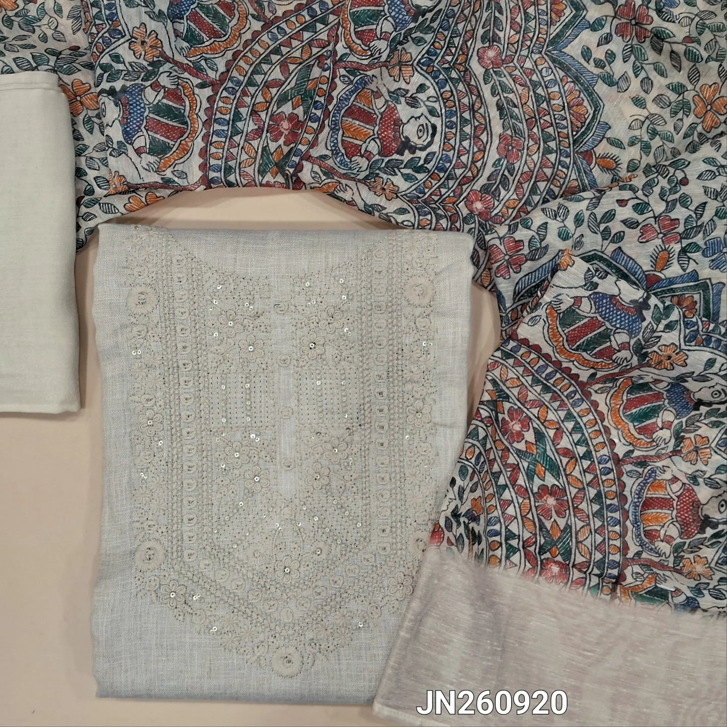 Rich Beige semi linen unstitched salwar material (textured,lining needed) self embroidery & sequins work on yoke, matching spun cotton bottom, madhubani digital printed semi linen dupatta with zari borders. JN260920