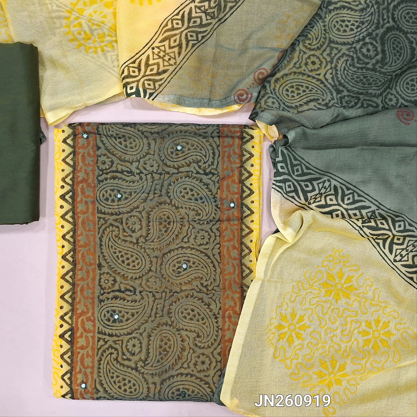 Pastel yellow & dark green block printed semi georgette unstitched salwar material,(lining needed)panel design, faux mirror work on front, maroon silk cotton bottom, block printed dual shaded fancy chiffon dupatta.(TAPING NEEDED)JN260919