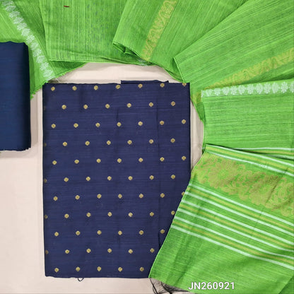 Dark blue slub silk cotton unstitched salwar material, gold zari weaving all over(lining needed)matching silk cotton bottom,silver and gold zari weaving on slub silk cotton dupatta with pallu.(TAPING NEEDED) JN260921