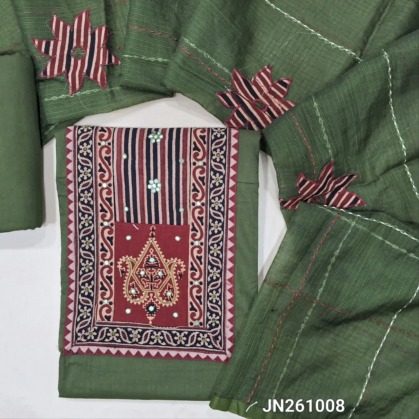 Leafy green premium dabu cotton unstitched salwar material,hand block prints & ajrak yoke patch with faux mirror work on yoke(lining optional)matching spun cotton bottom, floral applique work on kantha stitch detailing & kota dupatta. JN261008