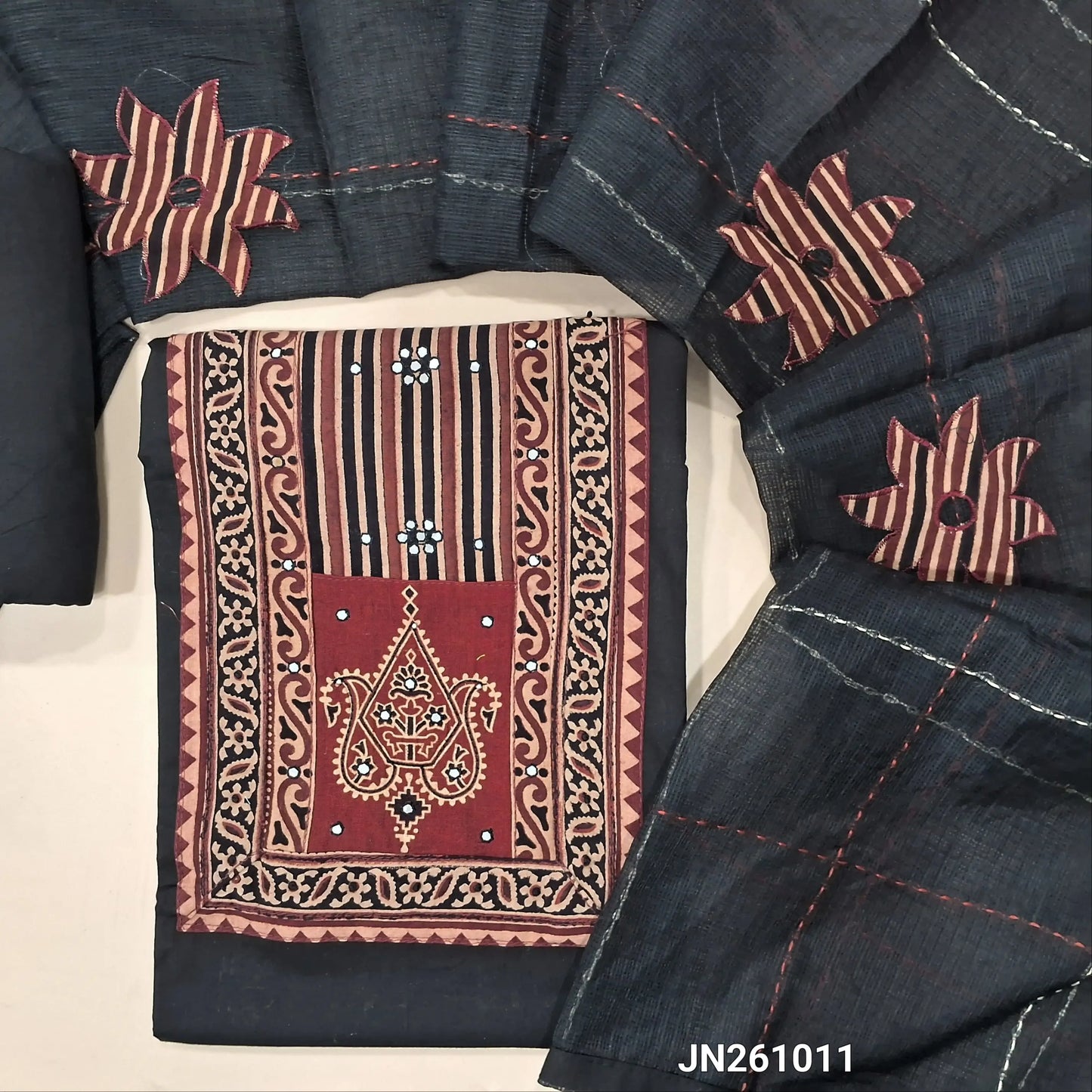 Black premium dabu cotton unstitched salwar material,hand block prints & ajrak yoke patch with faux mirror work on yoke(lining optional)matching spun cotton bottom, floral applique work on kantha stitch detailing & kota dupatta. JN261011