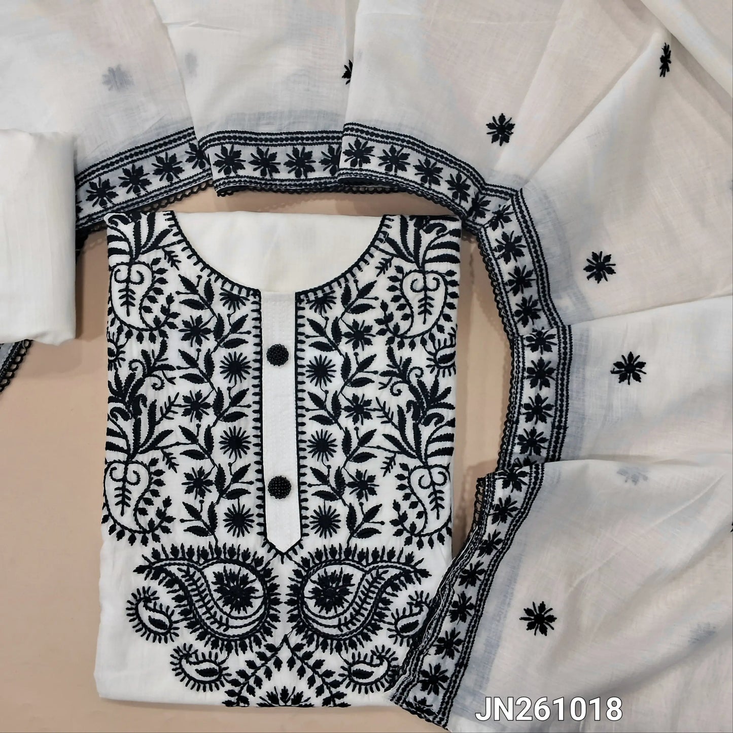 White hand embroidery soft silk cotton unstitched salwar material,chikankari embroidered & fancy buttons work on yoke( lining needed) matching cotton bottom, embroidery work on soft silk cotton dupatta with lace tapping. JN261018