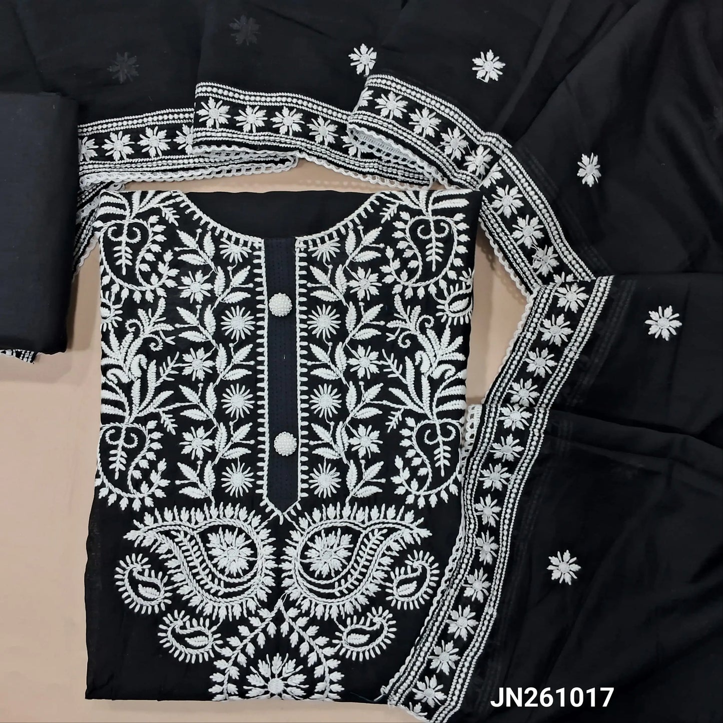 Black hand embroidery soft silk cotton unstitched salwar material,chikankari embroidered & fancy buttons work on yoke( lining needed) matching cotton bottom, embroidery work on soft silk cotton dupatta with lace tapping. JN261017