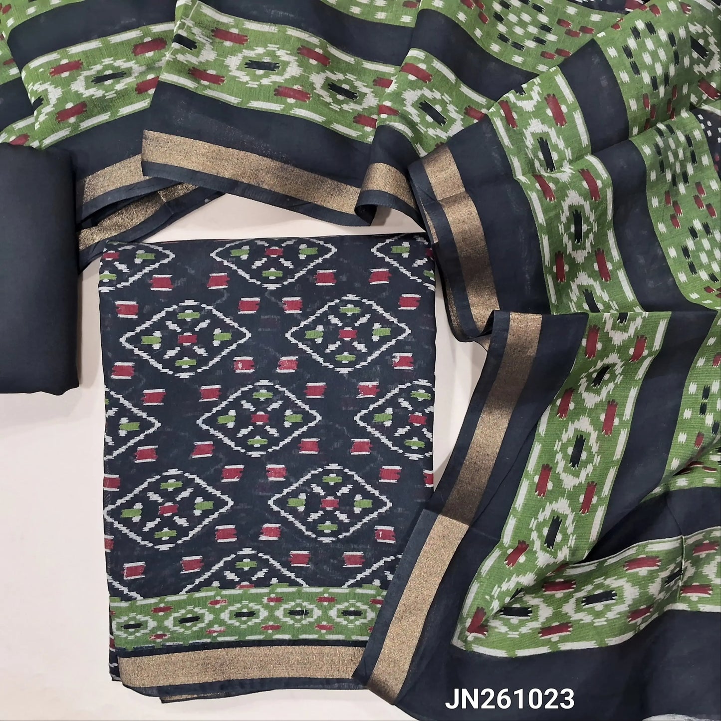 Black soft silk cotton unstitched salwar material,ikat printed all over ( Lining Needed) matching spun cotton bottom, ikat printed soft silk cotton full length dupatta (TAPINGS NEEDED). JN261023