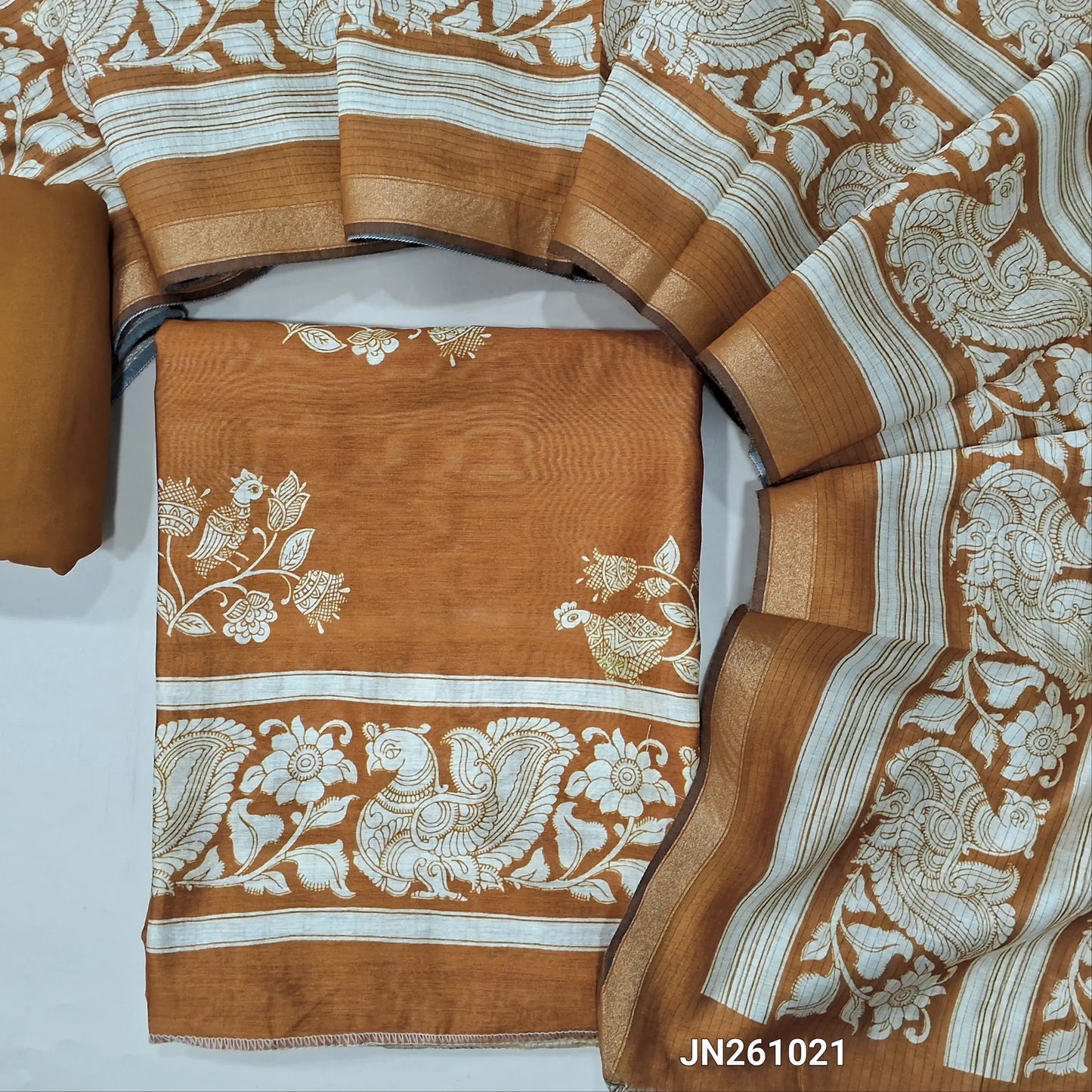 Rust orange digital printed soft silk cotton unstitched salwar material(lining needed)kalamkari prints all over, matching spun cotton bottom, digital printed soft silk cotton dupatta. JN261021