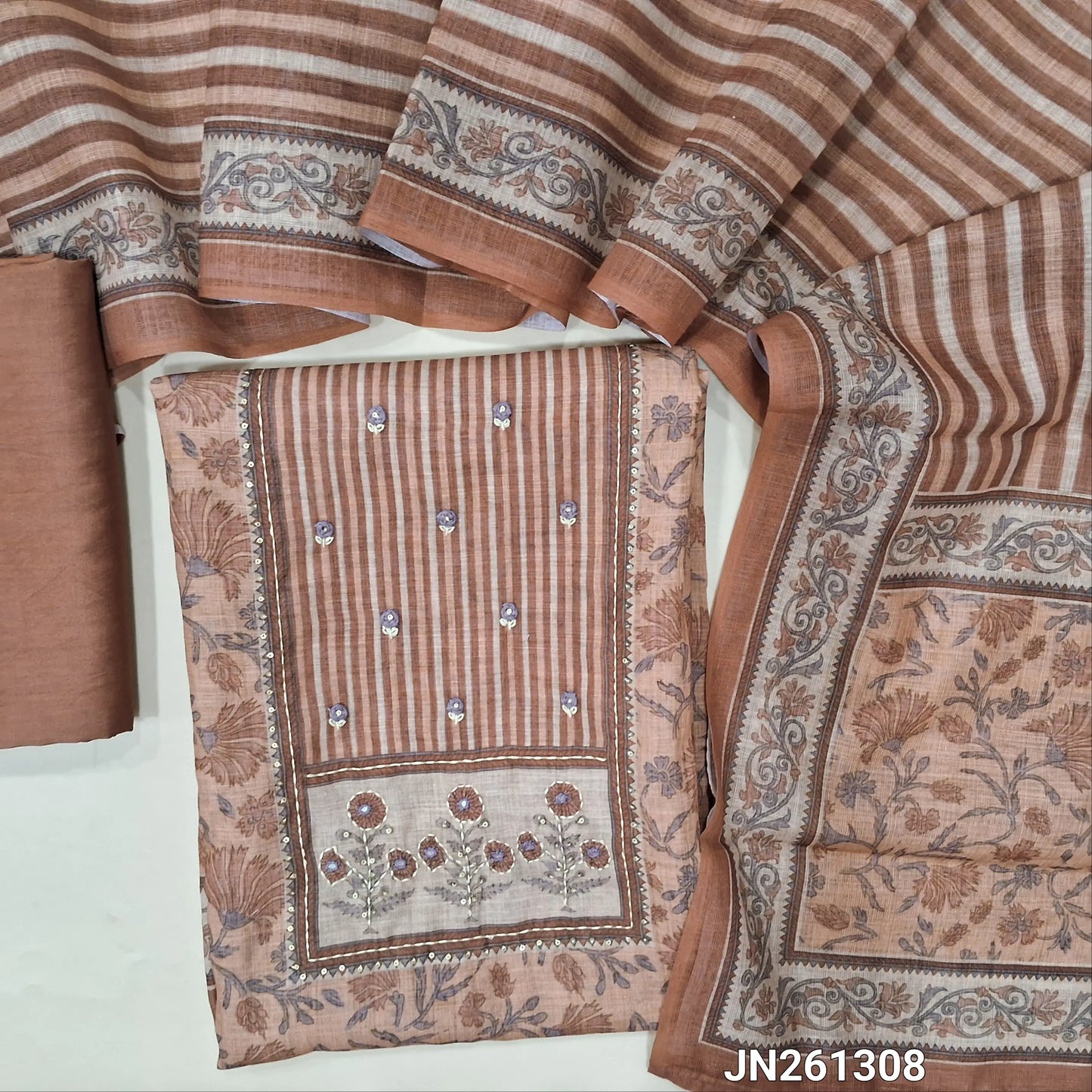 Peach floral printed semi linen unstitched salwar material (lining needed)hand embroidery, kantha stitch & sequins work on yoke, matching silky bottom, vertical printed semi linen dupatta. JN261308