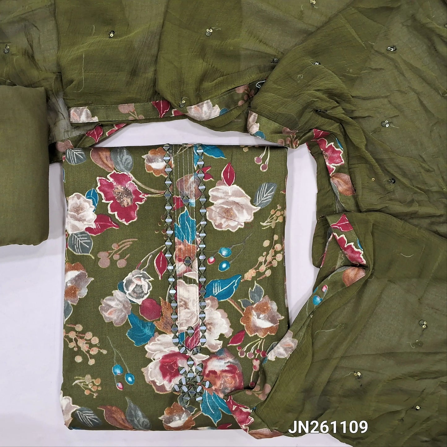 Dark green premium floral printed satin cotton unstitched salwar material, real mirror work on yoke( textured,lining optional)matching cotton bottom,thread & sequins work on fancy chiffon dupatta. JN261109