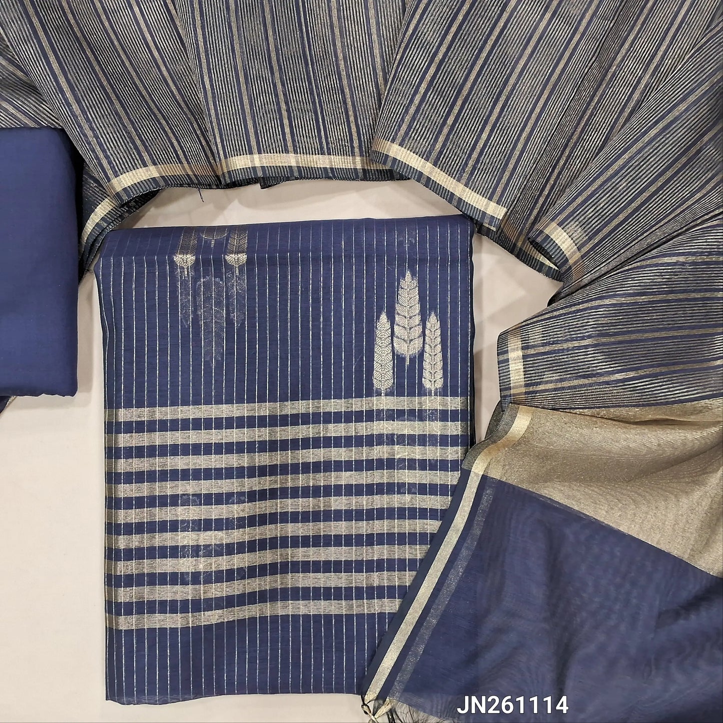 Dark blue benarasi woven silk cotton unstitched salwar material (lining needed) zari woven design all over, matching silk cotton bottom, golden tint tissue silk cotton dupatta with tassels. JN261114