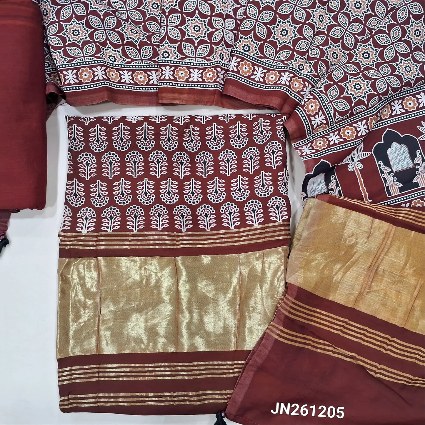 Dark maroon ajrak printed taspa silk unstitched salwar material(lining needed) gold tissue borders on daman, hand block prints all over,matching cotton bottom,ajrak printed taspa silk dupatta with tissue pallu (TAPING NEEDED) JN261205