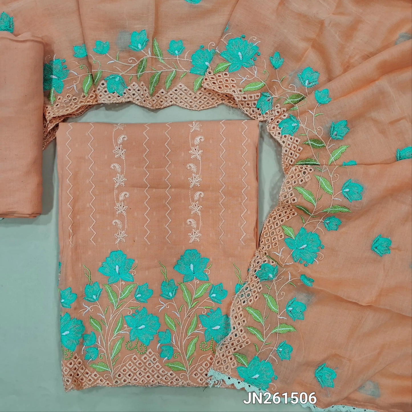 Designer pastel peach soft dobby cotton unstitched salwar material,floral work front, floral embroidery,cut work on daman (lining needed) drum dyed fabric provide for lining provided NO BOTTOM, embroidered soft mul cotton dupatta with borders. JN261506