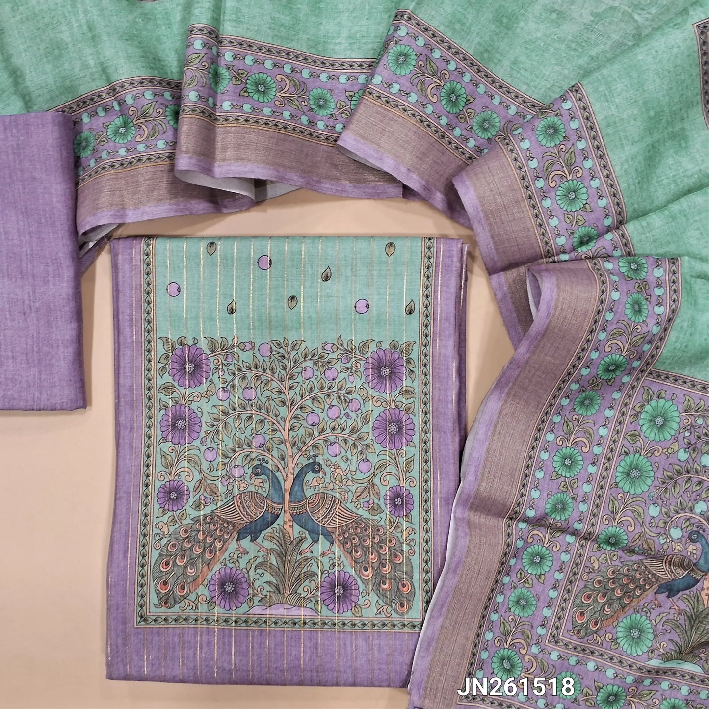 Lavender digital printed soft silk cotton unstitched salwar material(lining needed)peacock printed yoke,vertical gold zari lines all over,matching bottom,digital printed full length soft silk cotton dupatta.JN261518