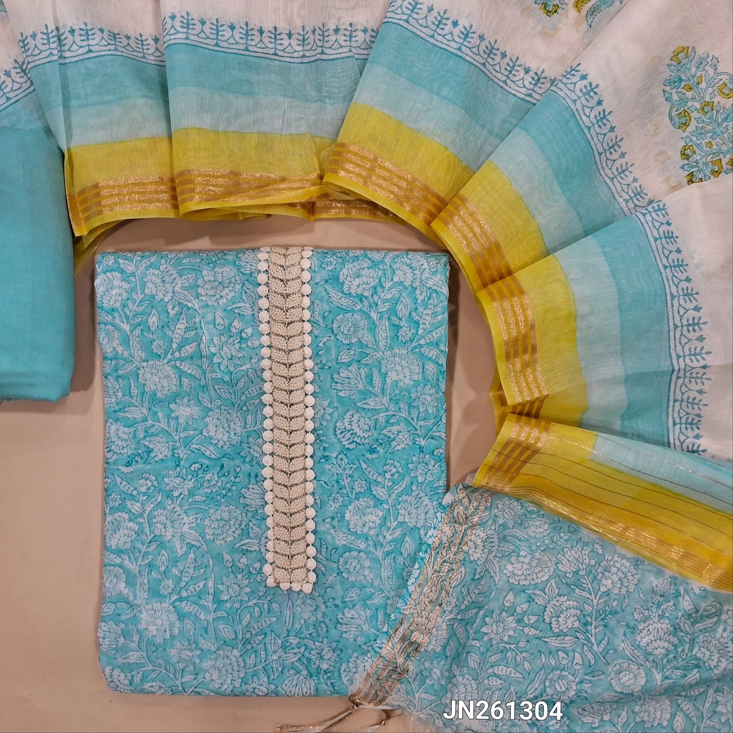 Pastel blue block printed chanderi silk cotton unstitched salwar material,thread work & fancy less work on yoke (light weight,Lining Needed) matching silky bottom, block printed chanderi silk cotton dupatta with zari detailing. JN261304
