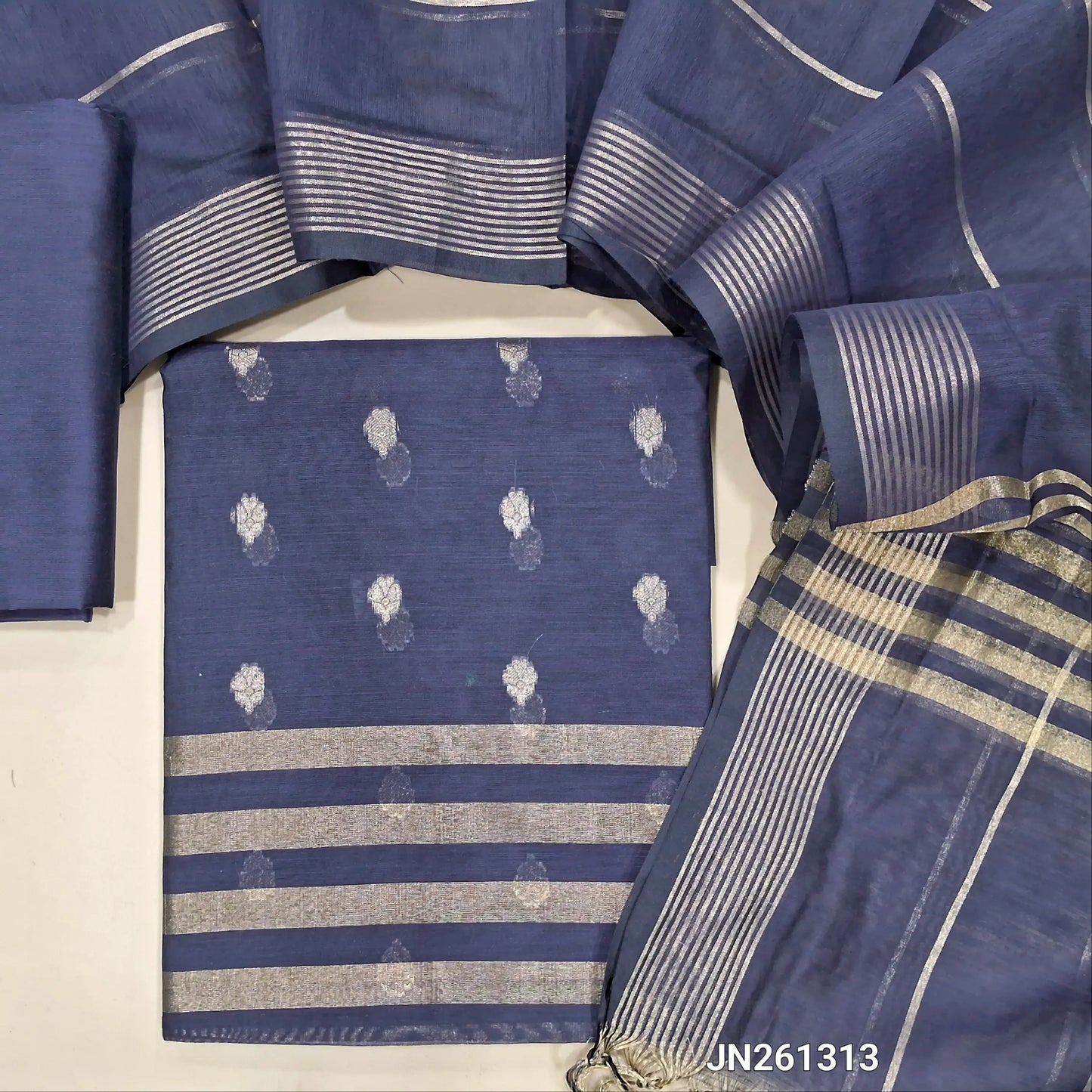 Navy blue Benarasi soft silk cotton unstitched salwar material(lining needed) gold zari buttas allover, tissue line daman, matching silk cotton bottom, zari linen soft silk cotton dupatta with gold tissue pallu. JN261313