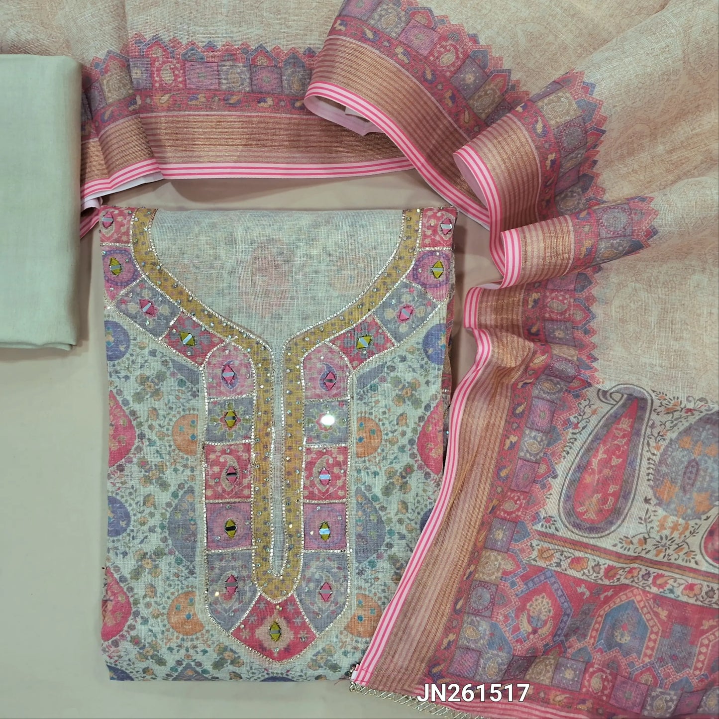 Pink shade golden tint premium tissue silk cotton unstitched salwar material,sequins & real mirror work on yoke,kota real mirror work daman(lining needed)matching cotton bottom,digital printed tissue silk cotton dupatta with borders. JN261517