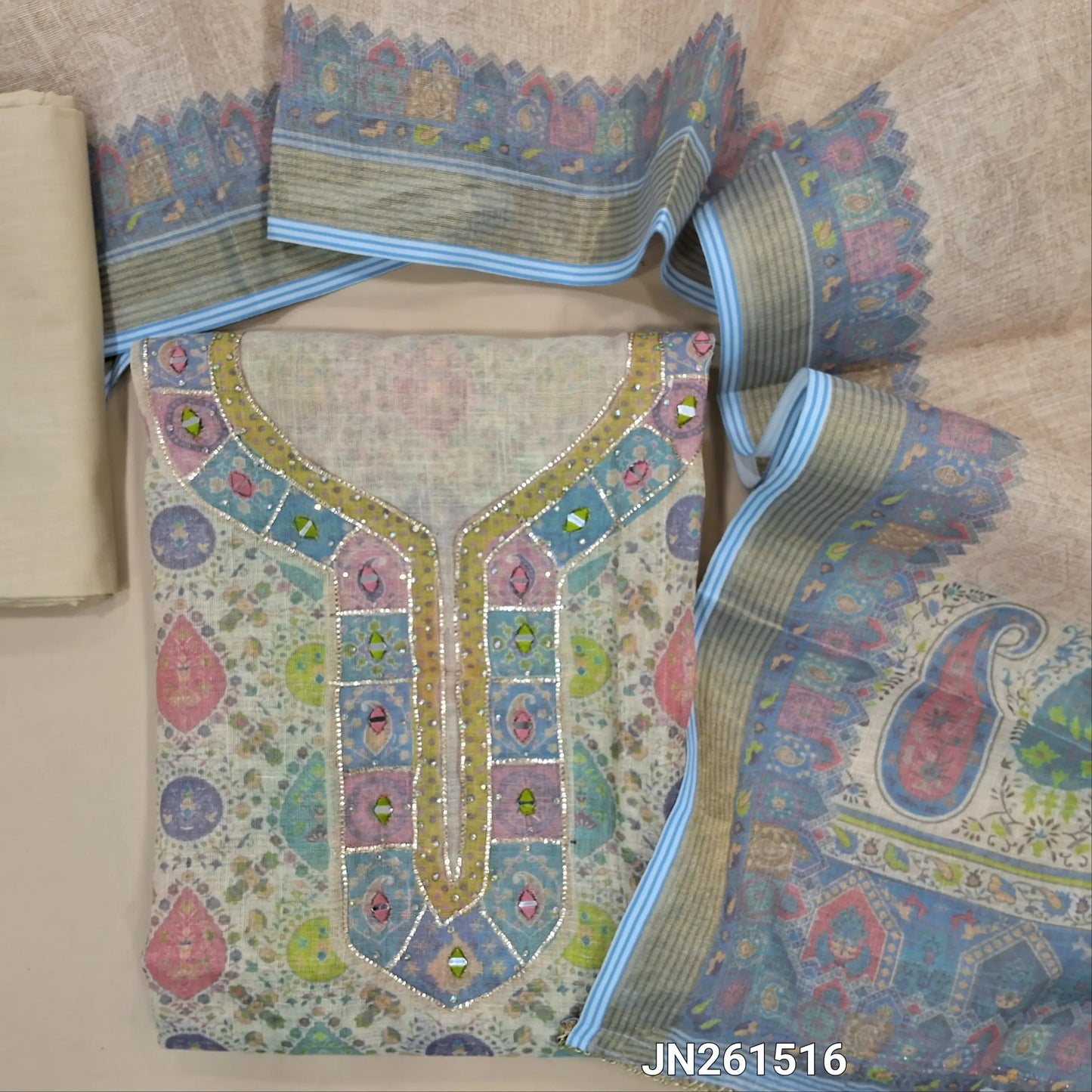 Pastel blue shade golden tint premium tissue silk cotton unstitched salwar material,sequins & real mirror work on yoke,kota real mirror work daman(lining needed)matching cotton bottom,digital printed tissue silk cotton dupatta with borders. JN261516