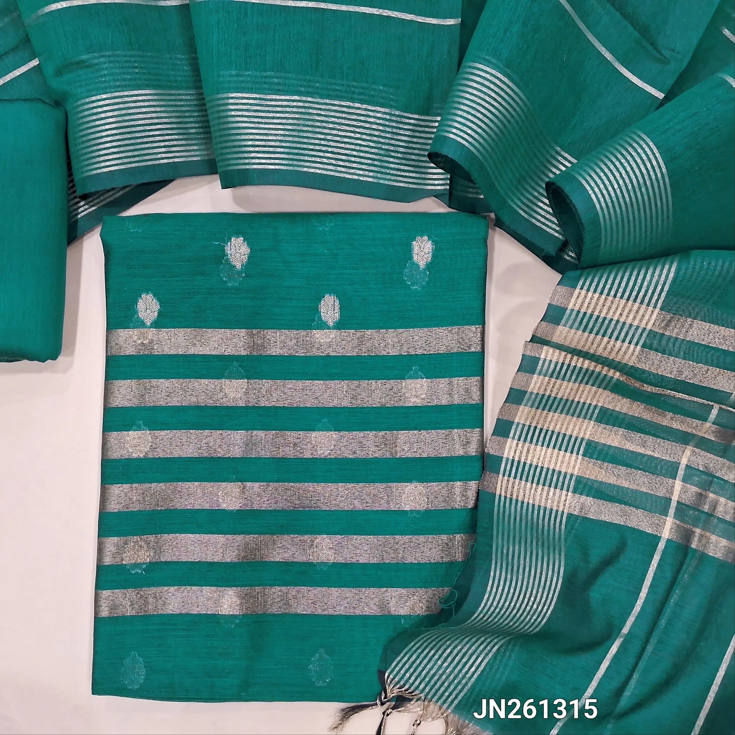 Peacock green Benarasi soft silk cotton unstitched salwar material(lining needed) gold zari buttas allover, tissue line daman, matching silk cotton bottom, zari linen soft silk cotton dupatta with gold tissue pallu. JN261315