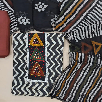 Black pure cotton unstitched salwar material,multicoloured thread work on yoke,zig zag printed all over,(lining needed)maroon spun cotton bottom,batik design on short width chiffon dupatta. JN261416