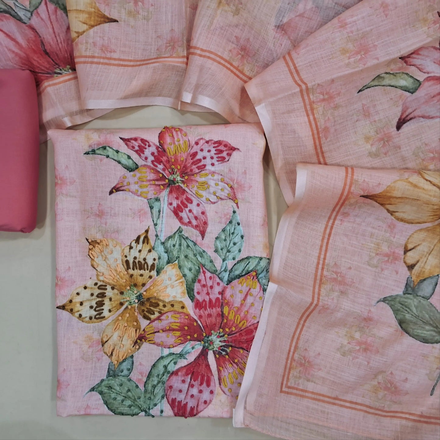 Pastel pink digital printed semi linen unstitched salwar material, sober printed all over, hand embroidered on daman(thin, lining needed)matching bottom,digital printed semi linen full length dupatta. JN261410
