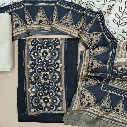 Black rayon fabric unstitched salwar material, printed and real mirror on yoke,(lining needed)off white cotton bottom, bandhini printed short width modal cotton dupatta. JN261408