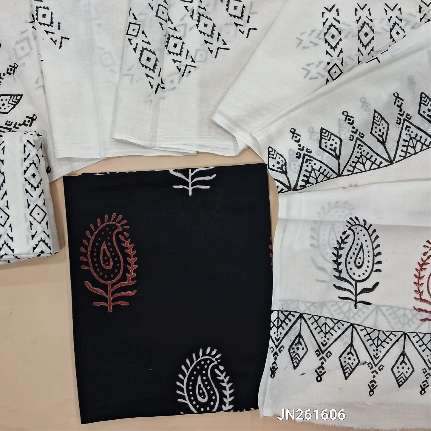 Black hand block printed pure mul cotton unstitched salwar material,(lining optional)hand block printed white cotton bottom,block printed full length mul cotton dupatta. (TAPPING NEEDED, INCONSISTENT PRINTS ARE NOT DEFECTS) JN261606