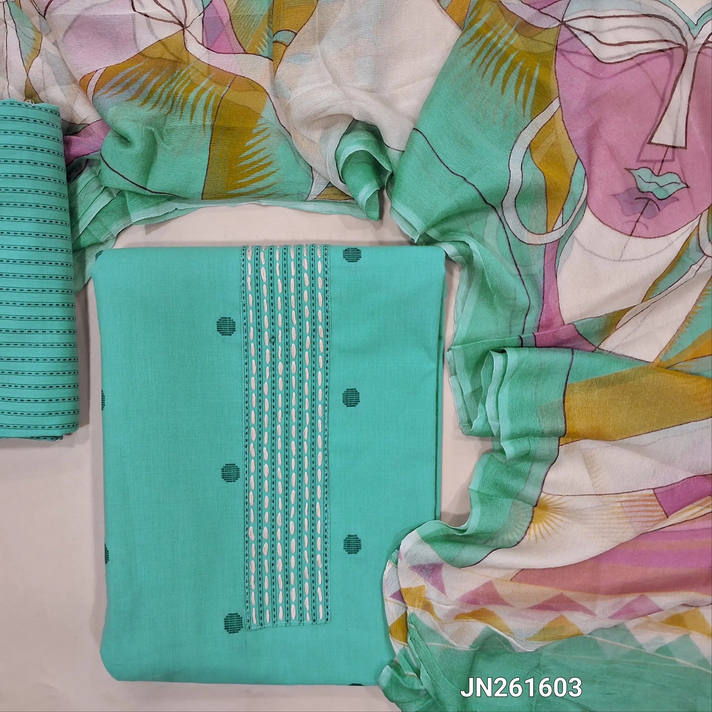 Pastel blue premium handloom cotton unstitched salwar material,stitch work on yoke, thread woven buttas all over, (lining needed)thread weaving handloom cotton bottom,multicolor abstract design on pure chiffon dupatta(TAPPING NEEDED). JN261603