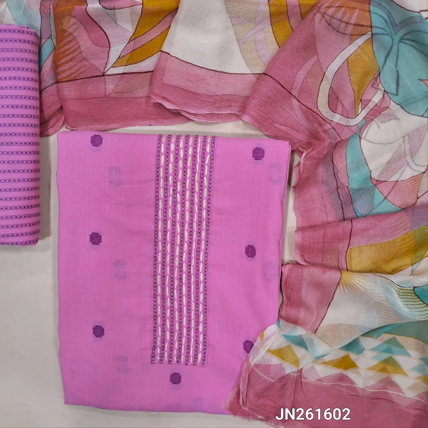 Pastel pink premium handloom cotton unstitched salwar material,stitch work on yoke, thread woven buttas all over, (lining needed)thread weaving handloom cotton bottom,multicolor abstract design on pure chiffon dupatta(TAPPING NEEDED). JN261602