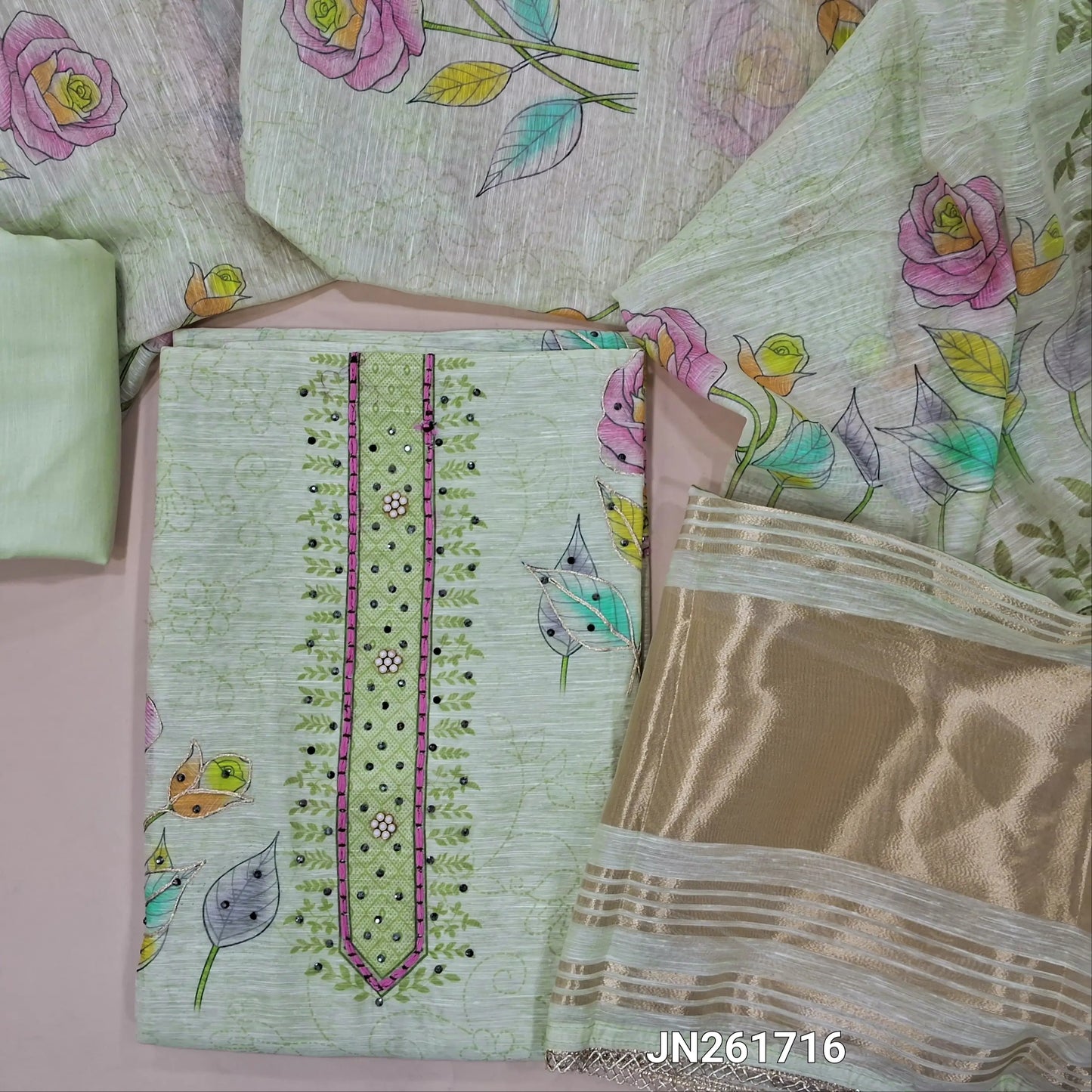 Designer pastel green floral printed linen unstitched salwar material,fancy buttons and sequins work on yoke & front, gold tissue border on daman( lining needed)matching cotton bottom,floral printed linen dupatta with fancy less tapping. JN261716