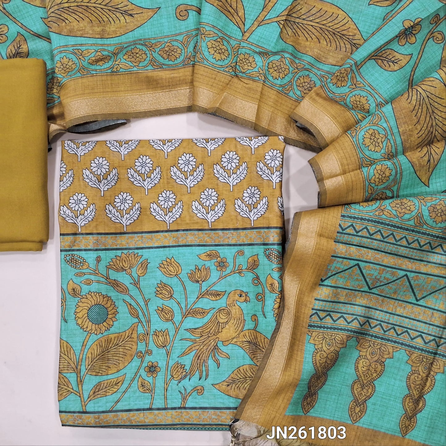Mehandhi yellow digital printed soft silk cotton unstitched salwar material(lining needed) printed all over,matching spun cotton bottom, digital printed soft silk cotton dupatta with tissue borders. JN261803