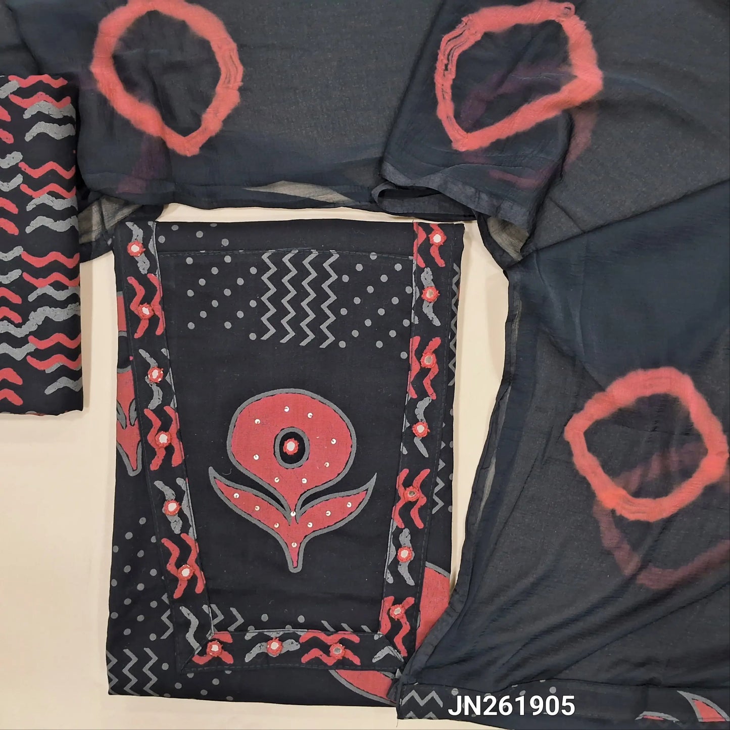 Black premium cotton unstitched salwar material (lining optional)block printed & real mirror work on yoke, printed all over, printed cotton bottom,shibori dyed fancy chiffon dupatta.(TAPPING NEEDED) JN261905