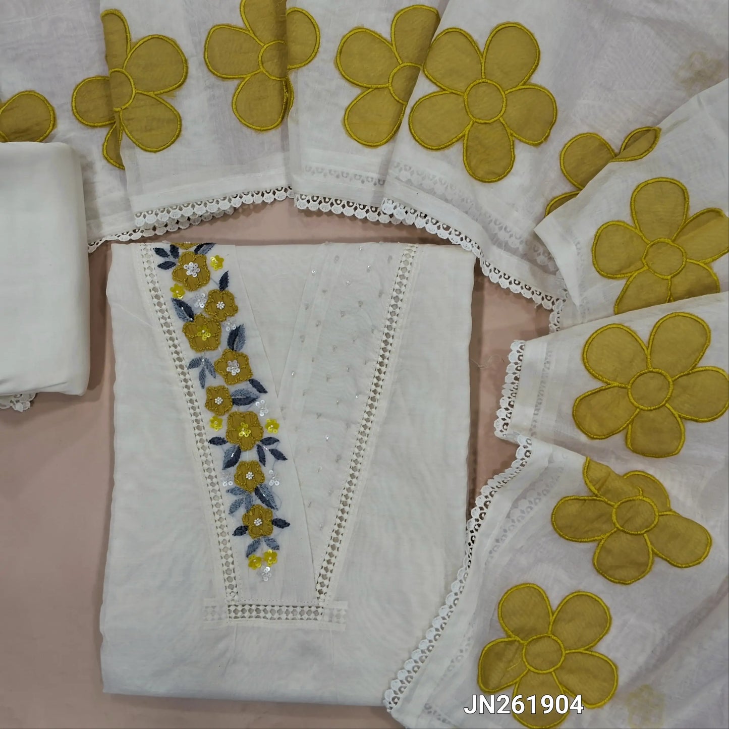 Designer off white base mul chanderi unstitched salwar material ,v neck on yoke with hand embroidery,applique work & cut bead work,(YELLOW)(thin,Lining Needed)matching silk cotton bottom, floral embroidery &applique work on mul chanderi dupatta. JN261904