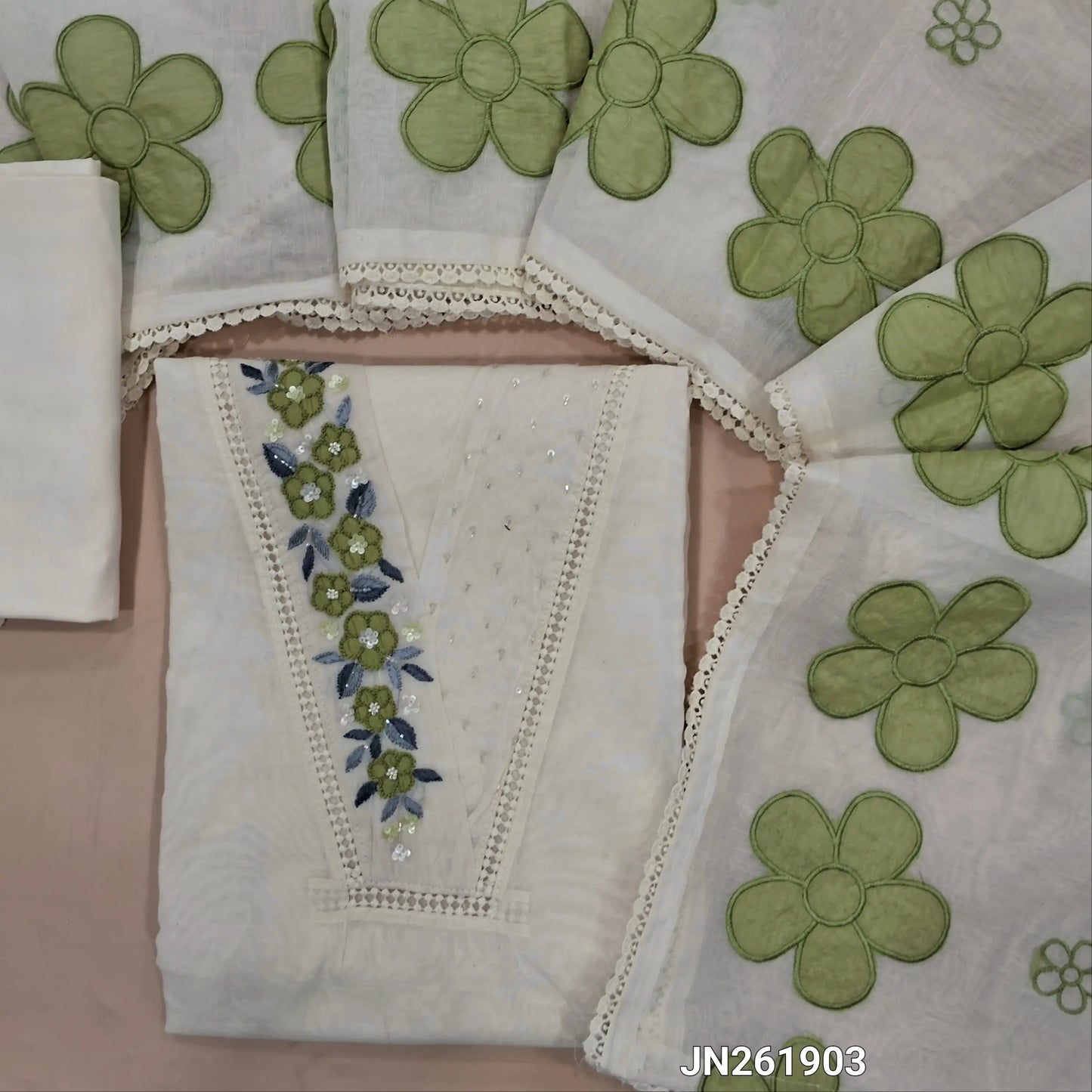 Designer off white base mul chanderi unstitched salwar material ,v neck on yoke with hand embroidery,applique work & cut bead work,(GREEN)(thin,Lining Needed)matching silk cotton bottom, floral embroidery &applique work on mul chanderi dupatta. JN261903